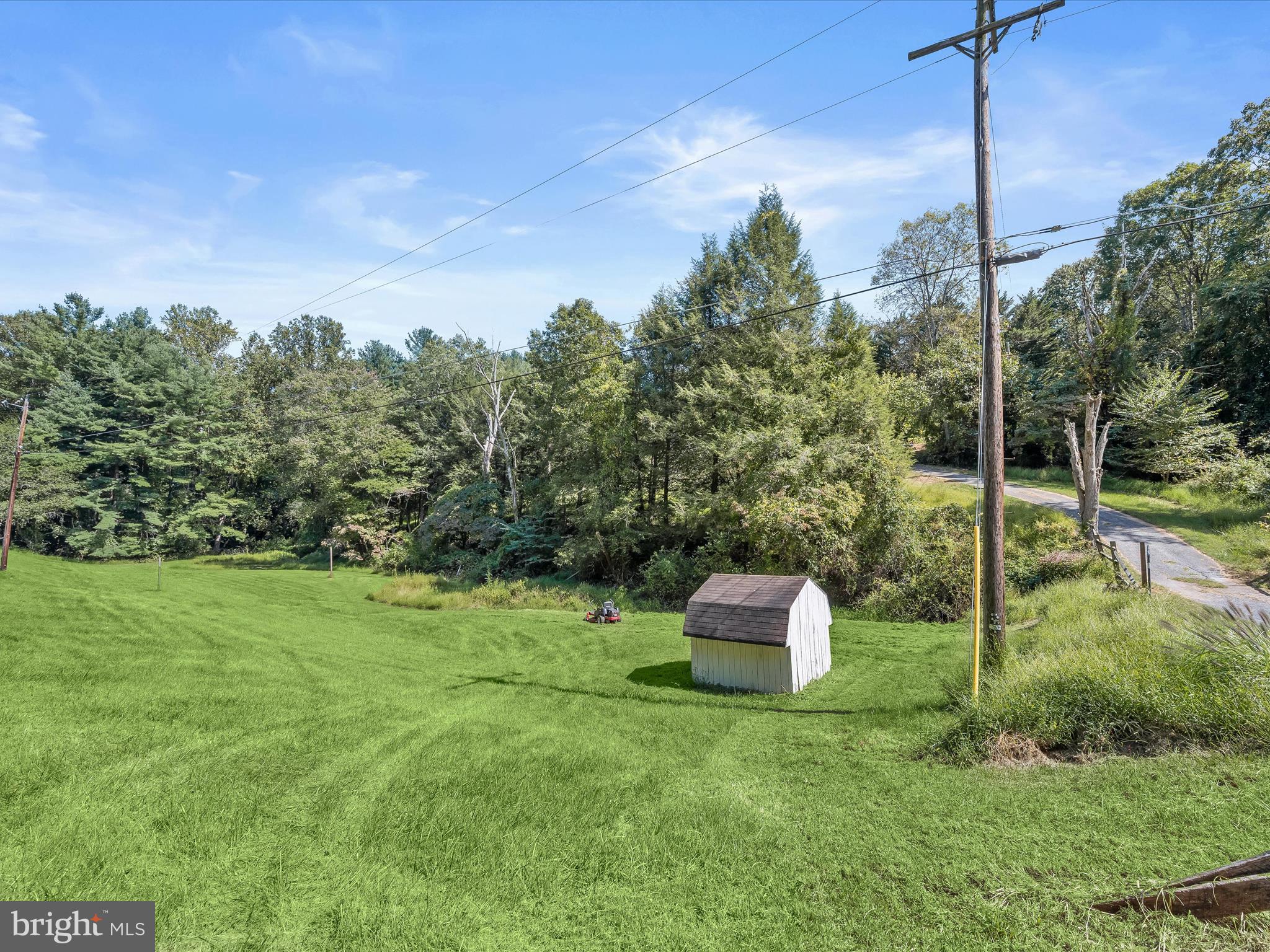 17515 Masemore Road Parkton, MD 21120 - Photo 29 of 36 a big yard with lots of green space and plants