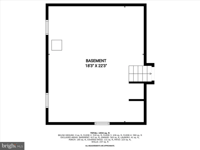 a view of a green field with wooden fence