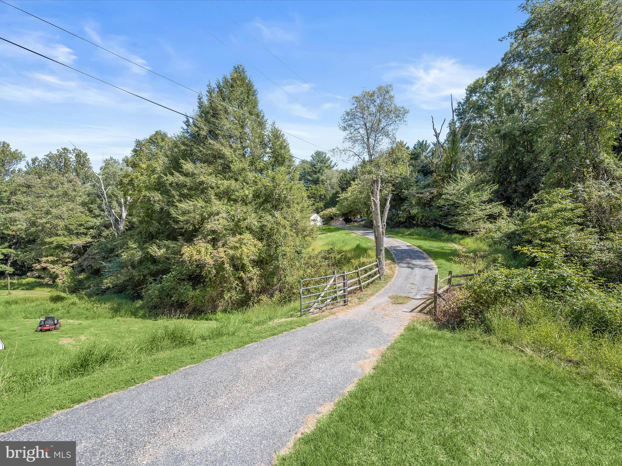 17515 Masemore Road Parkton, MD 21120 - Photo 4 of 36 a view of a park with large trees