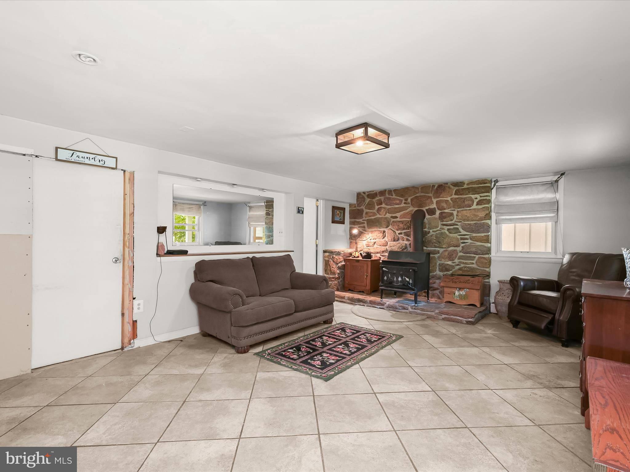 17515 Masemore Road Parkton, MD 21120 - Photo 6 of 36 a living room with furniture and a window