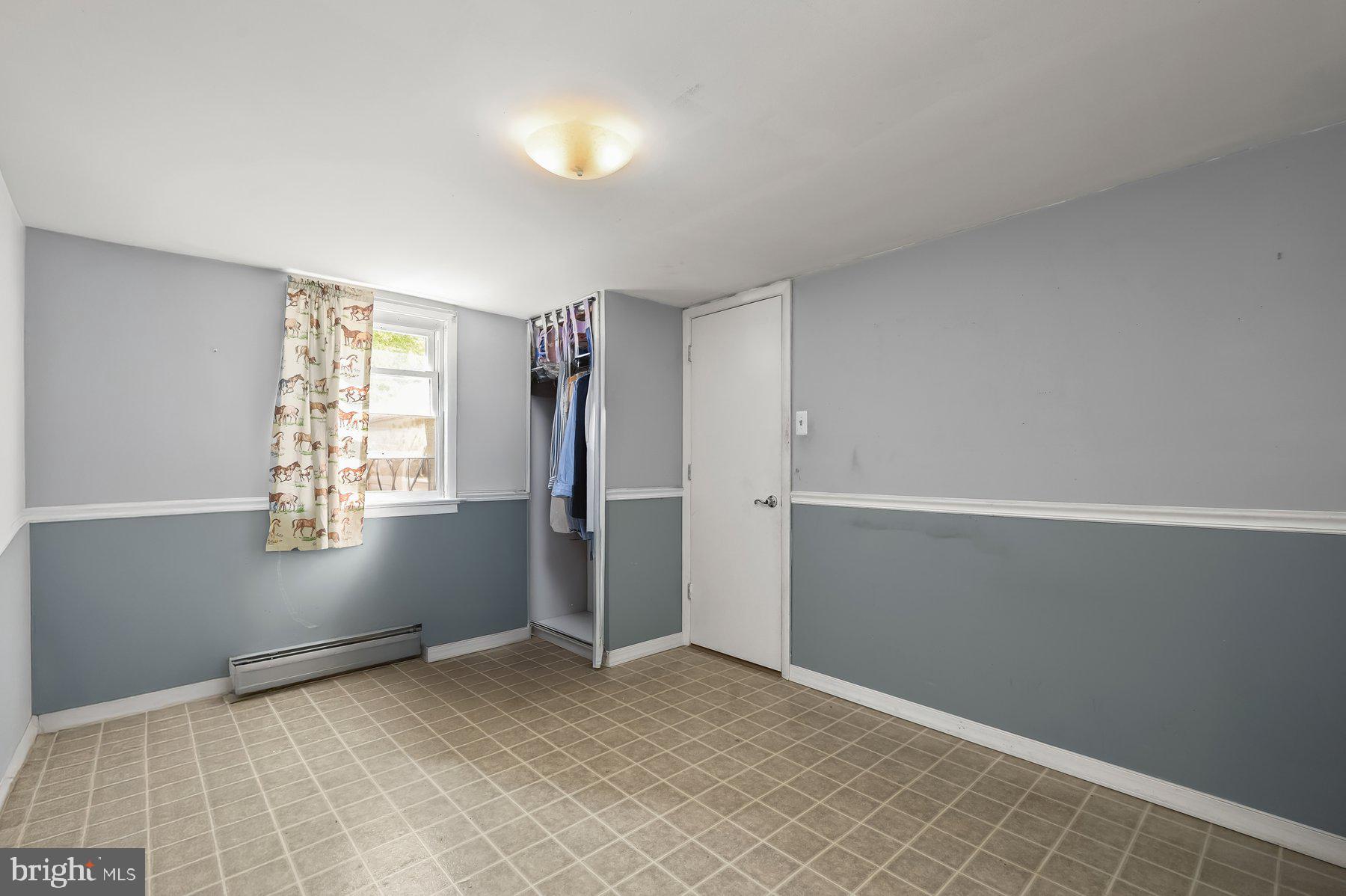 17515 Masemore Road Parkton, MD 21120 - Photo 7 of 36 a view of an empty room with a window