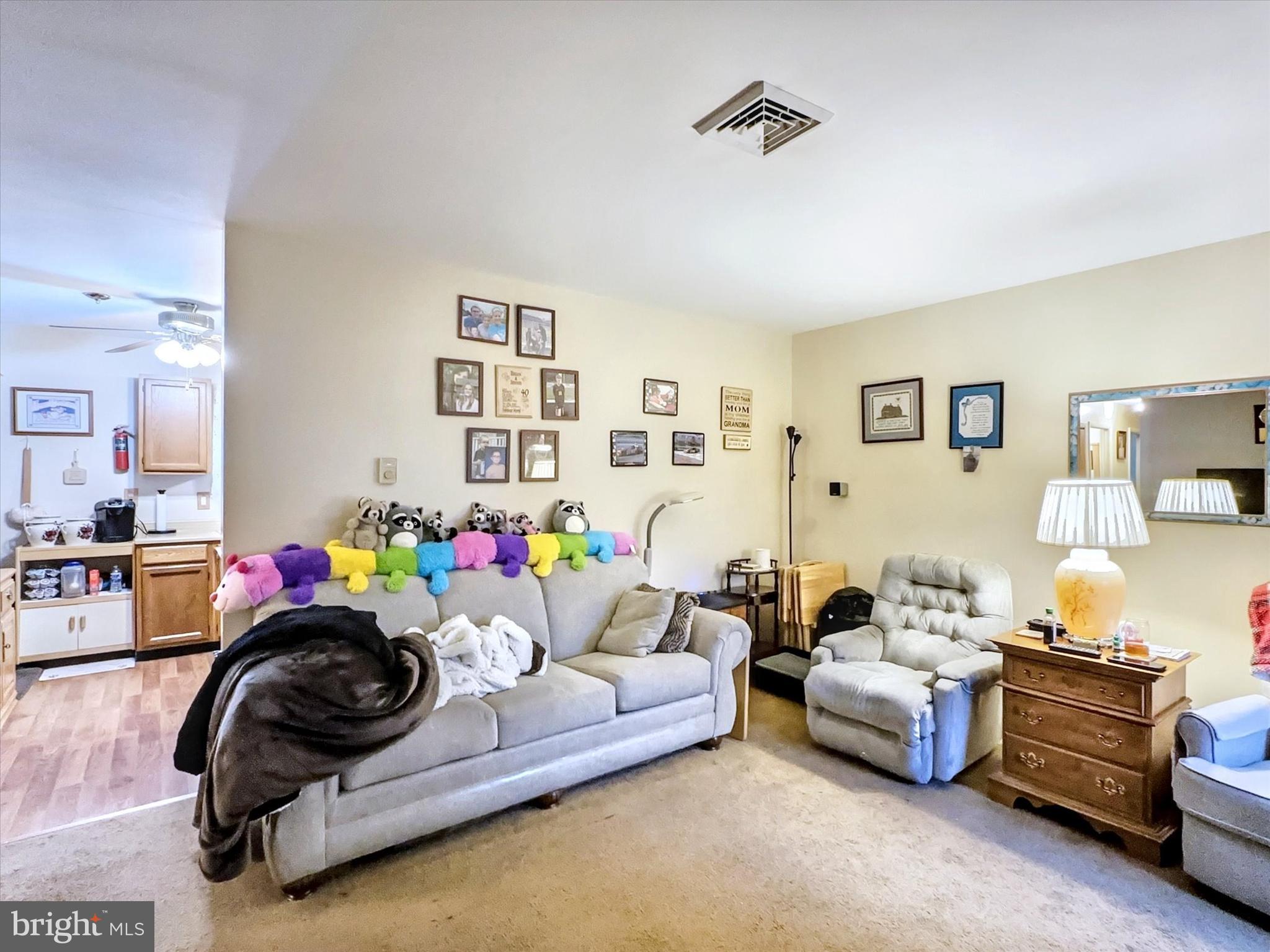 1392 Manor Road Windsor, PA 17366 - Photo 6 of 22 a bedroom with furniture and a couch