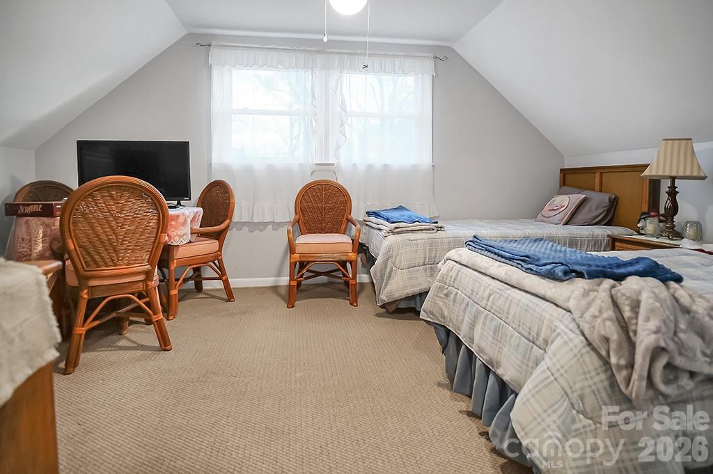 122 Rockman Road Grover, NC 28073 - Photo 28 of 45 a bedroom with two beds and a window