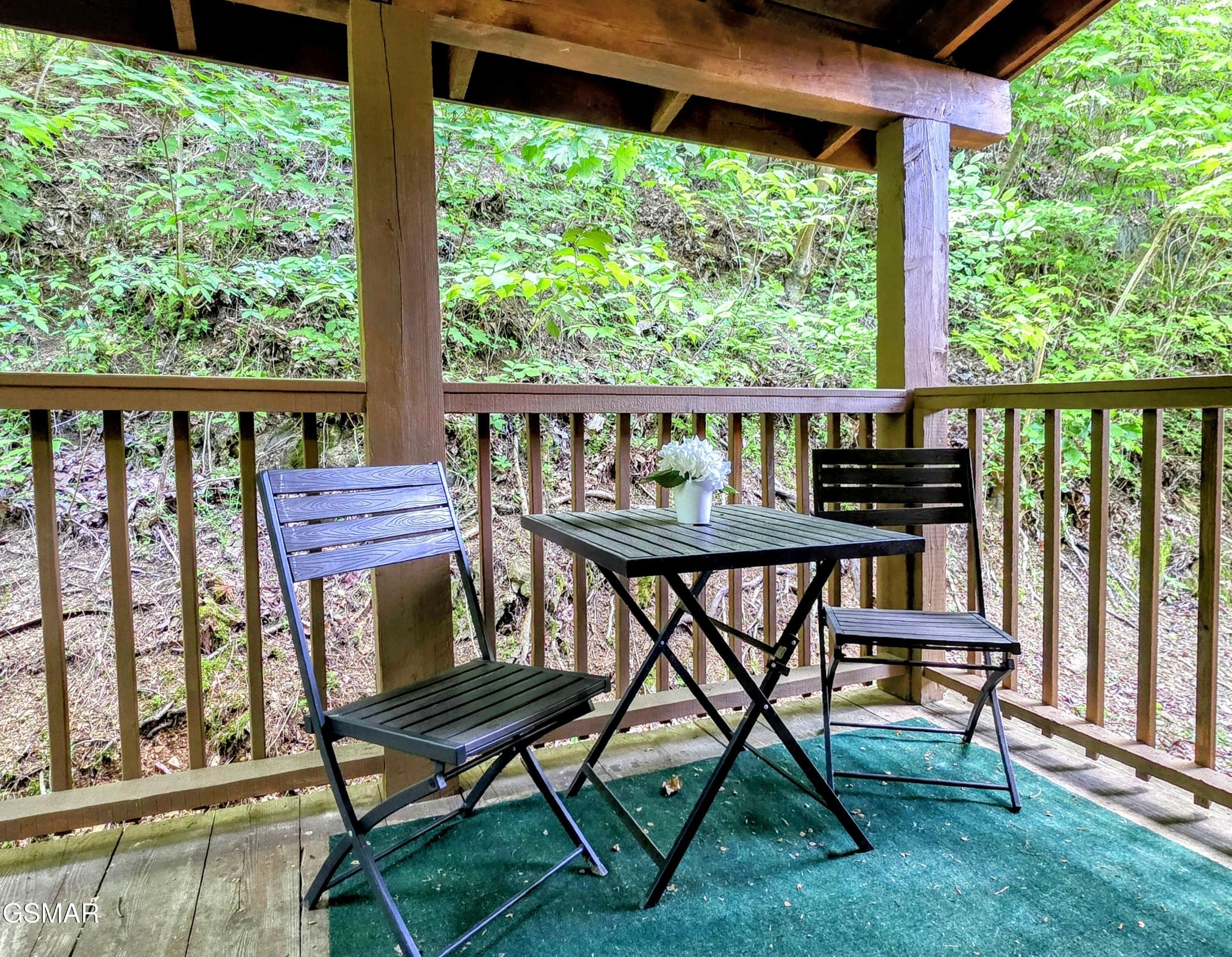 2570 Pittman Center Road Sevierville, TN 37876 - Photo 53 of 61 a view of a chairs and table in the deck