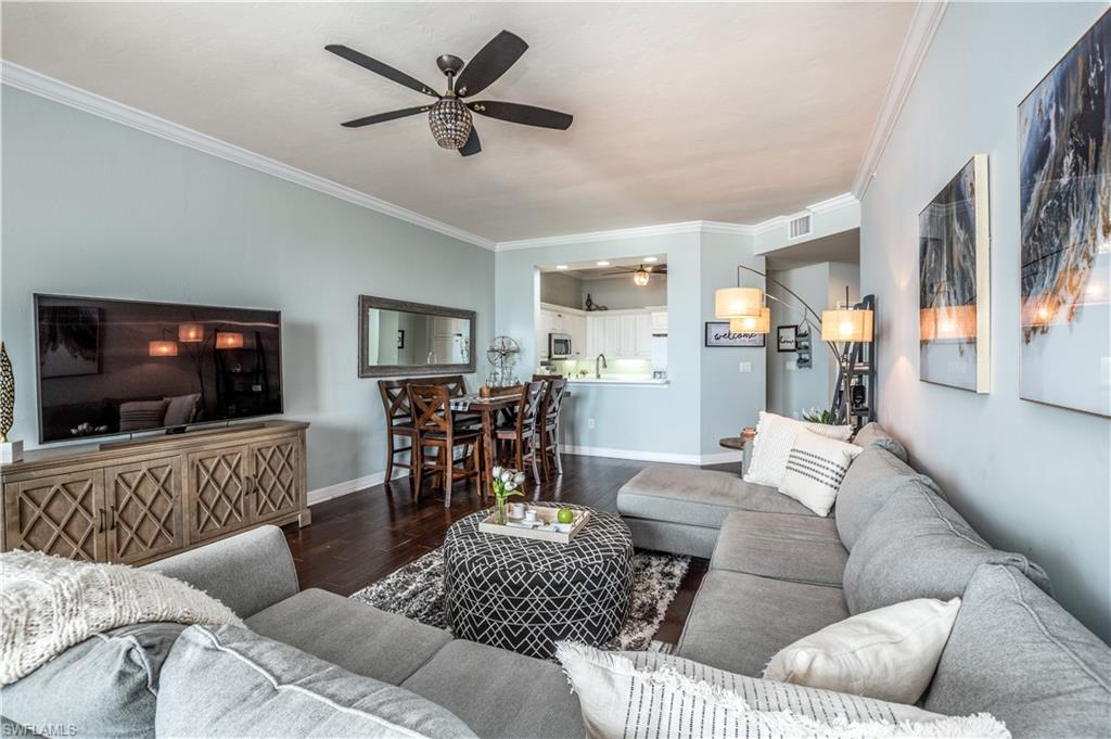 450 Bayfront Place, Unit 4508 Naples, FL 34102 - Photo 4 of 24 a living room with furniture and a flat screen tv