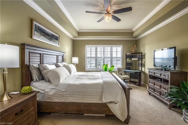a bathroom with a double vanity sink mirror and bathtub