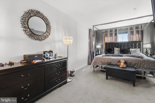 a front view of a house with a basket ball court