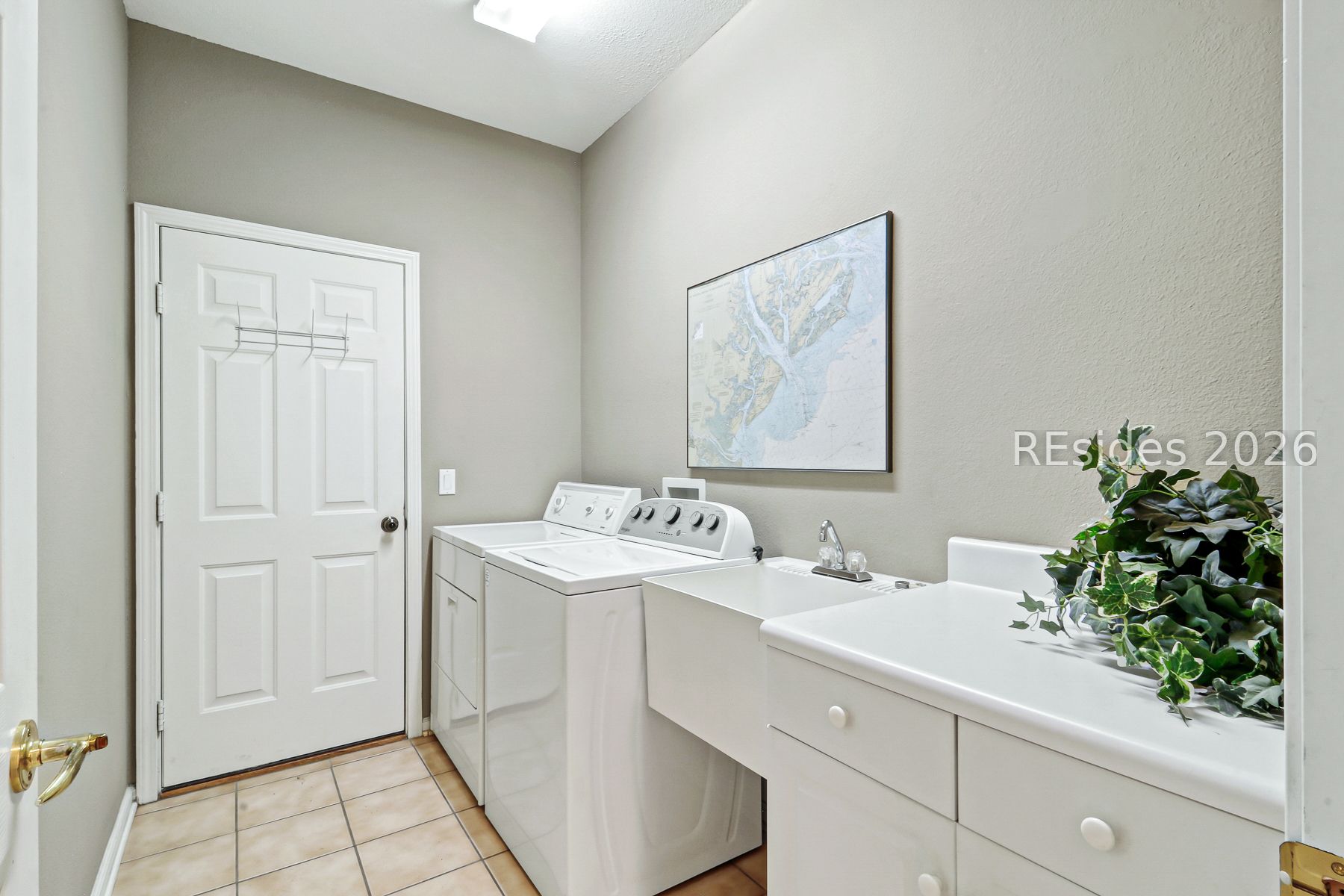 167 Hampton Circle Bluffton, SC 29909 - Photo 28 of 59 Large laundry room and access to garage.