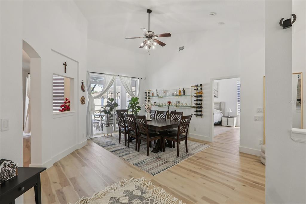 1524 Stipule Court Trinity, FL 34655 - Photo 15 of 43 a view of a dining room with furniture and chandelier