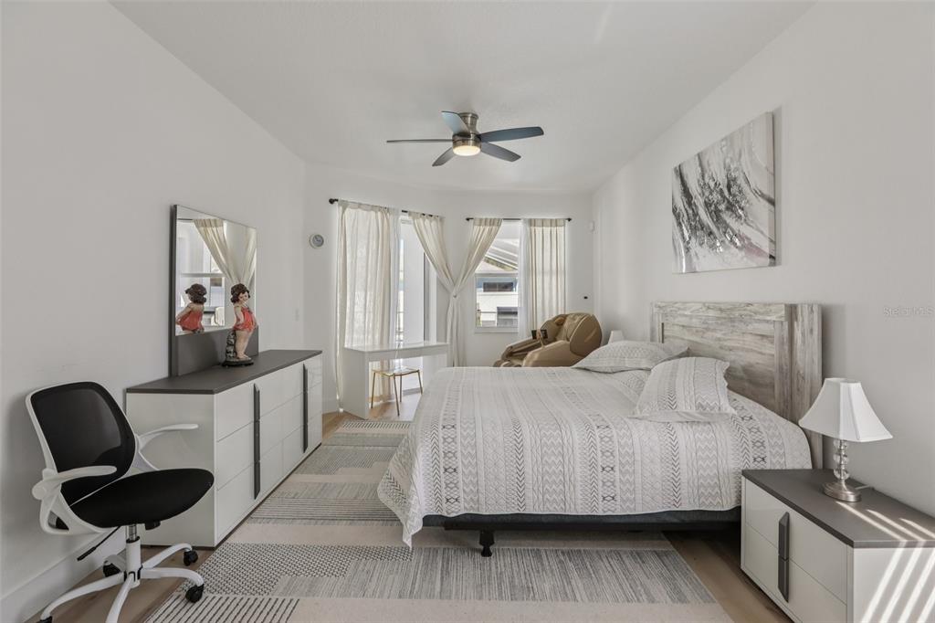 1524 Stipule Court Trinity, FL 34655 - Photo 22 of 43 a bedroom with a bed and dresser