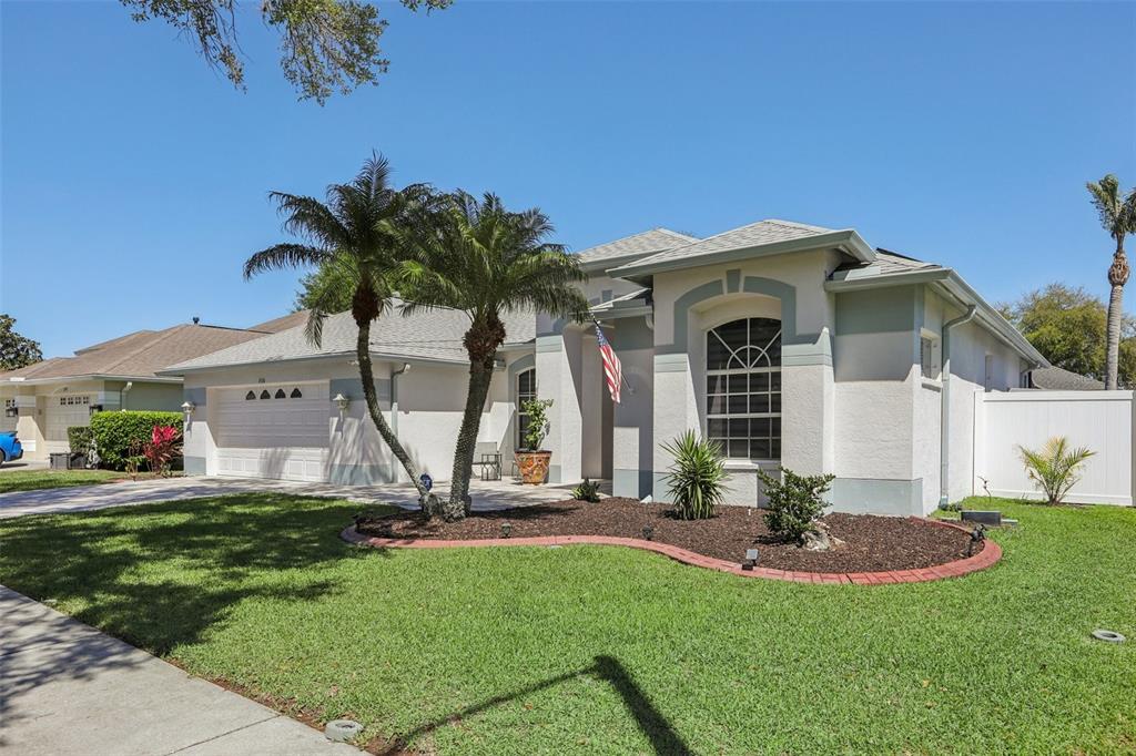 1524 Stipule Court Trinity, FL 34655 - Photo 3 of 43 a front view of house with yard