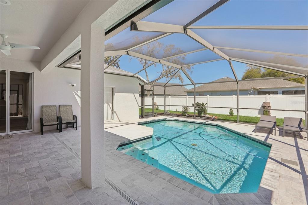 1524 Stipule Court Trinity, FL 34655 - Photo 37 of 43 a room with lots of table and chairs