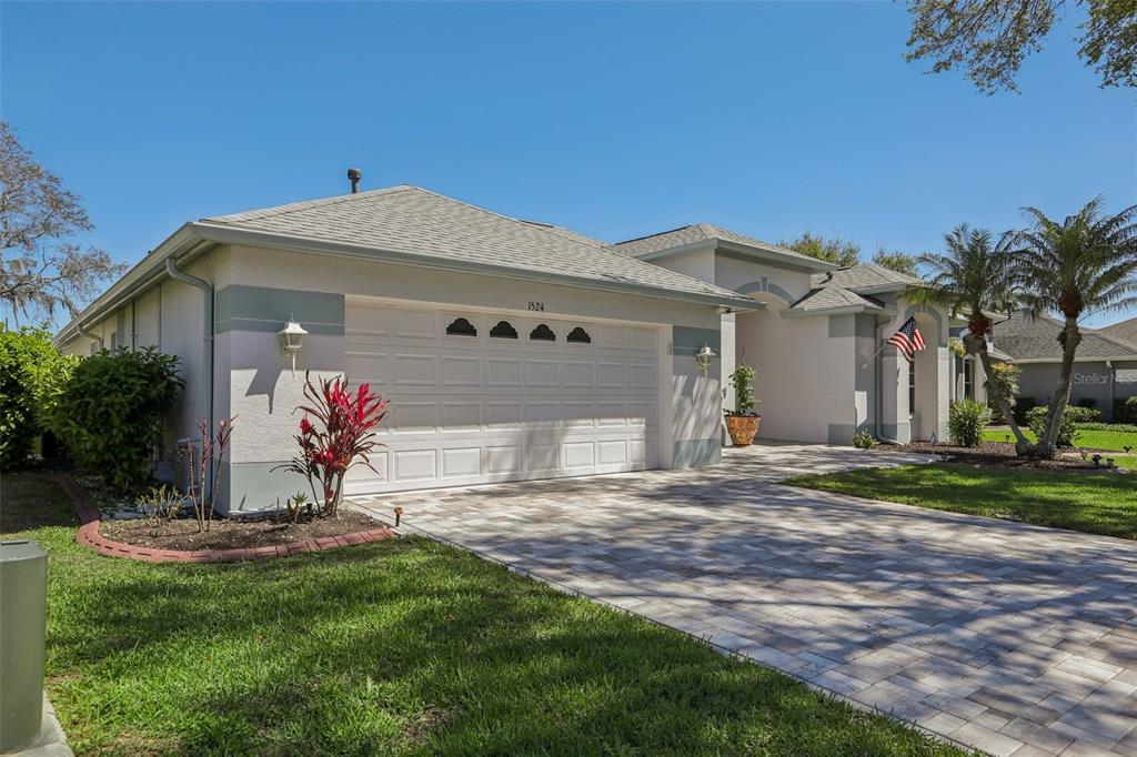 1524 Stipule Court Trinity, FL 34655 - Photo 4 of 43 a front view of a house with a yard