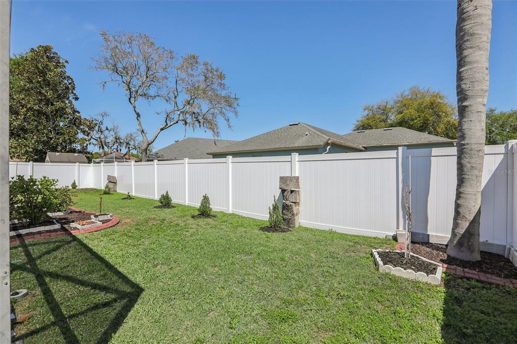 1524 Stipule Court Trinity, FL 34655 - Photo 41 of 43 a front view of a house with garden