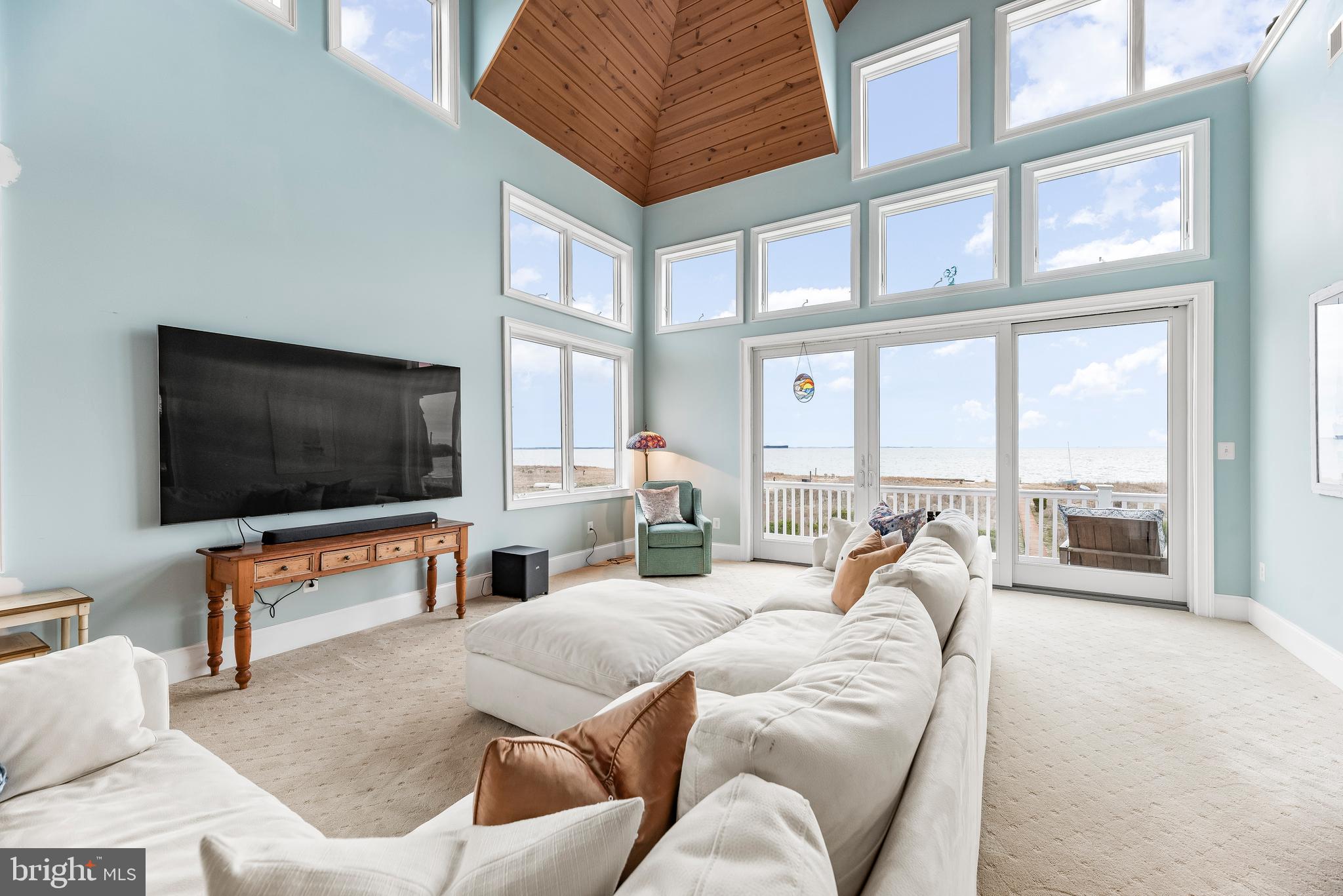 3095 Calvert Boulevard Lusby, MD 20657 - Photo 39 of 104 Room is banked with massive windows and views!