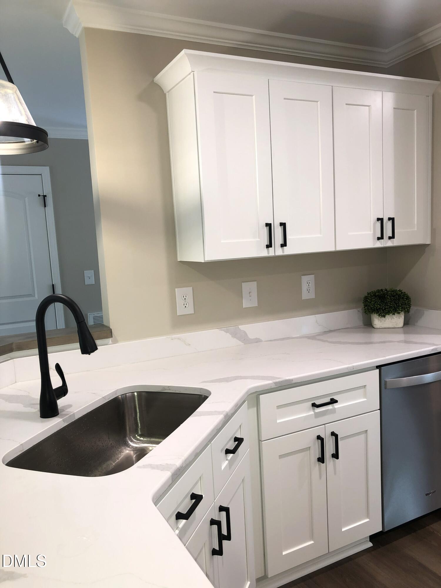 95 Smith Taylor Trail Roxboro, NC 27574 - Photo 19 of 47 a kitchen with a sink and cabinets