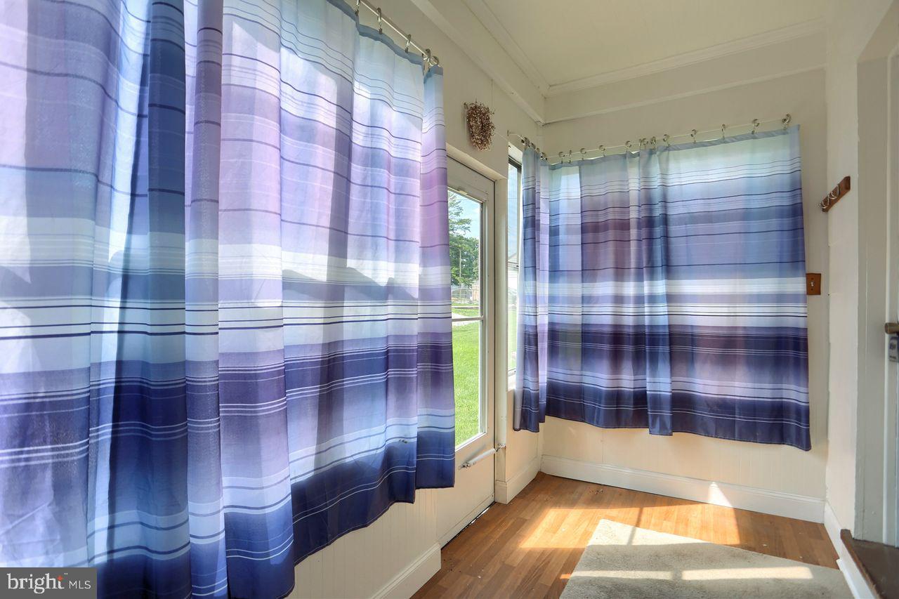 1706 West King Street York, PA 17404 - Photo 11 of 24 Enclosed rear porch is perfect for hanging coats!
