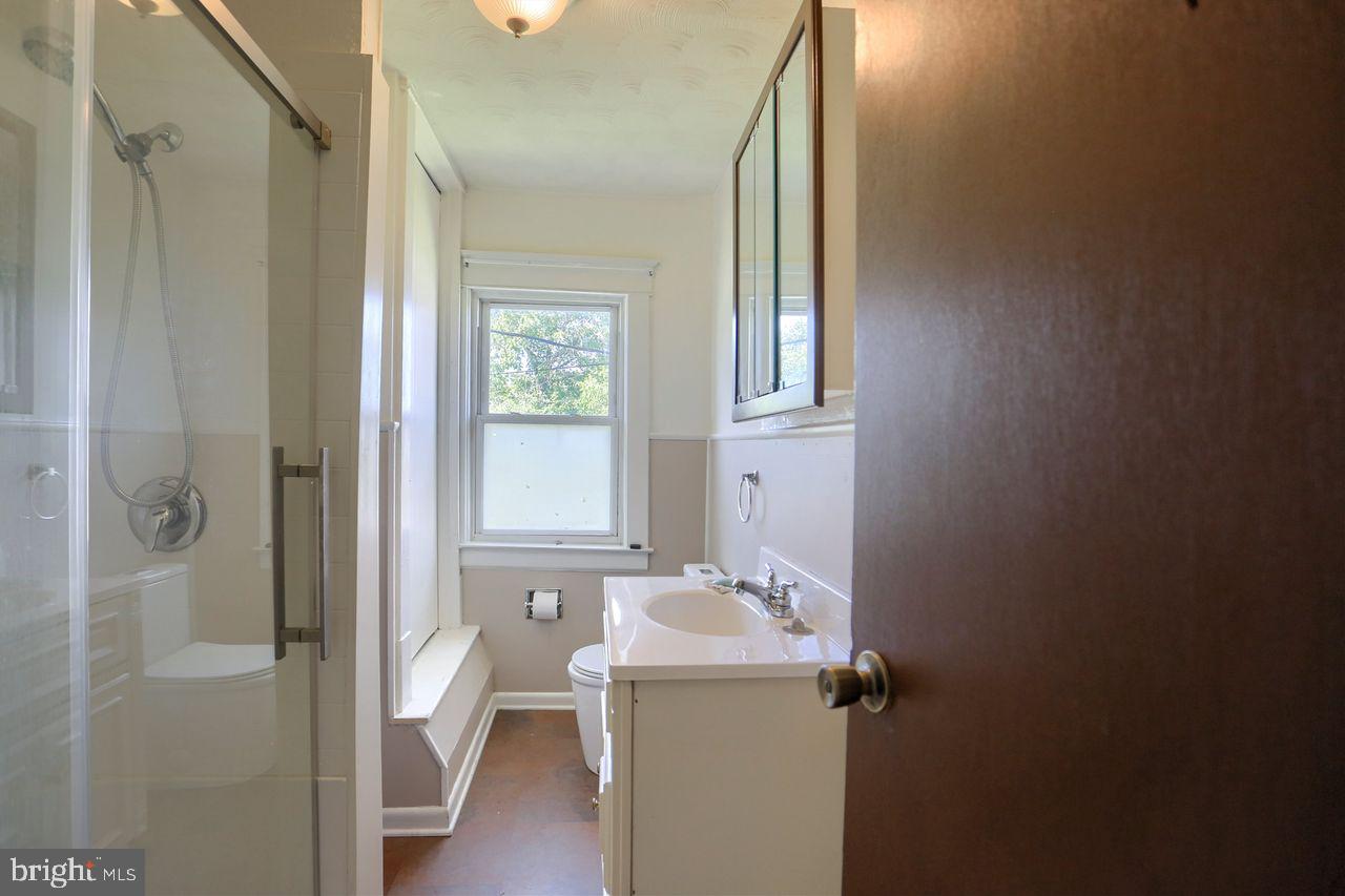 1706 West King Street York, PA 17404 - Photo 15 of 24 Updated bath with glass shower doors.