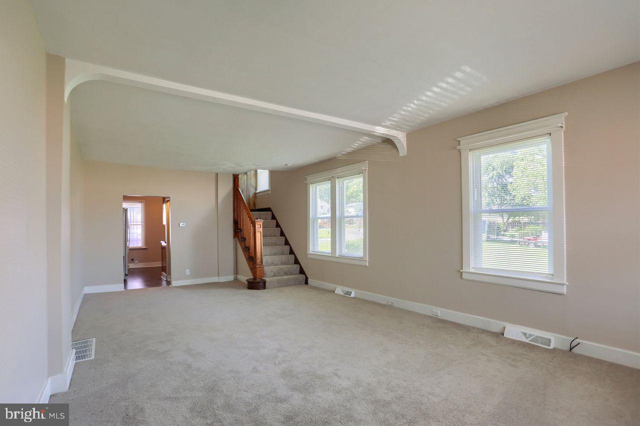 1706 West King Street York, PA 17404 - Photo 5 of 24 Spacious living room with new carpet.