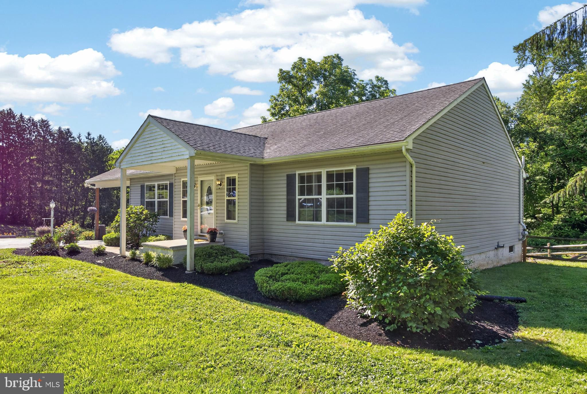 311 Hillendale Road Avondale, PA 19311 - Photo 35 of 40 Landscaped front yard