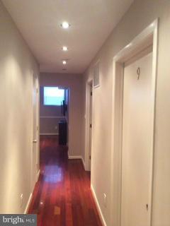 605 P Street Northwest Washington, DC 20001 - Photo 12 of 28 a view of hallway with a room and wooden floor