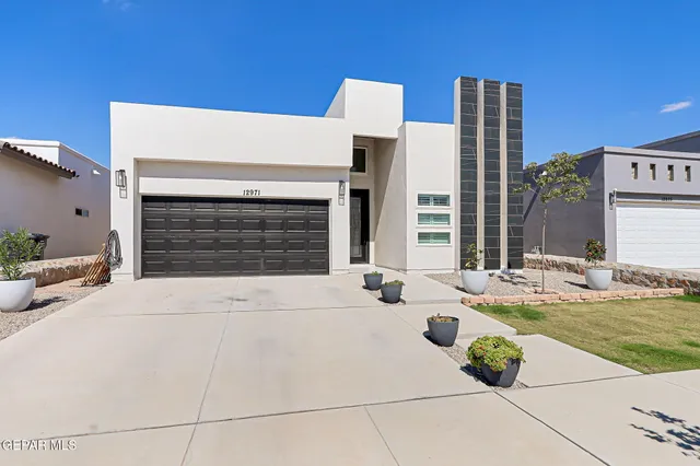 a view of a house with swimming pool