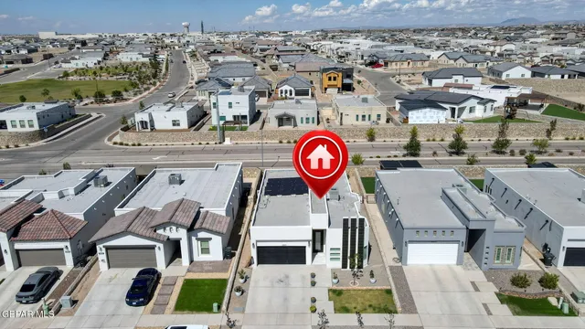 an aerial view of a city with lots of residential buildings