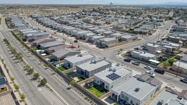 a view of swimming pool with outdoor seating