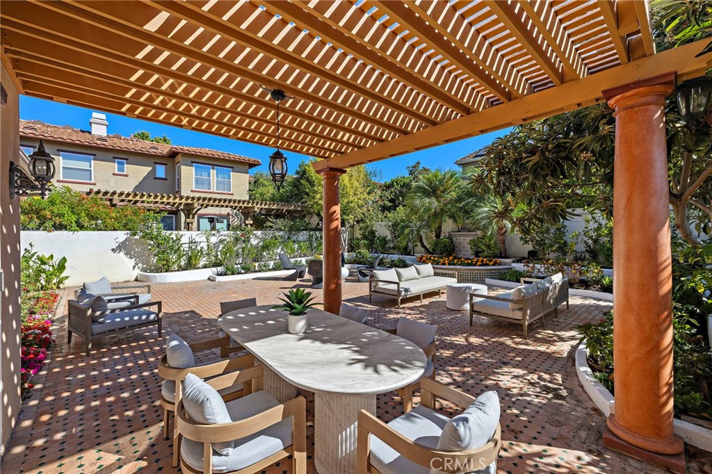 18 Bel Spring Irvine, CA 92602 - Photo 33 of 44 a view of a chairs and table in patio