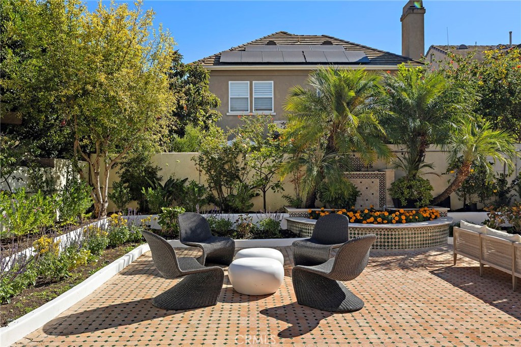 18 Bel Spring Irvine, CA 92602 - Photo 35 of 44 a view of a patio with couches table and chairs and potted plants