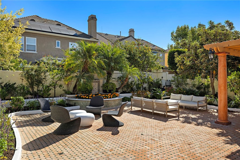 18 Bel Spring Irvine, CA 92602 - Photo 37 of 44 a front view of a house with patio
