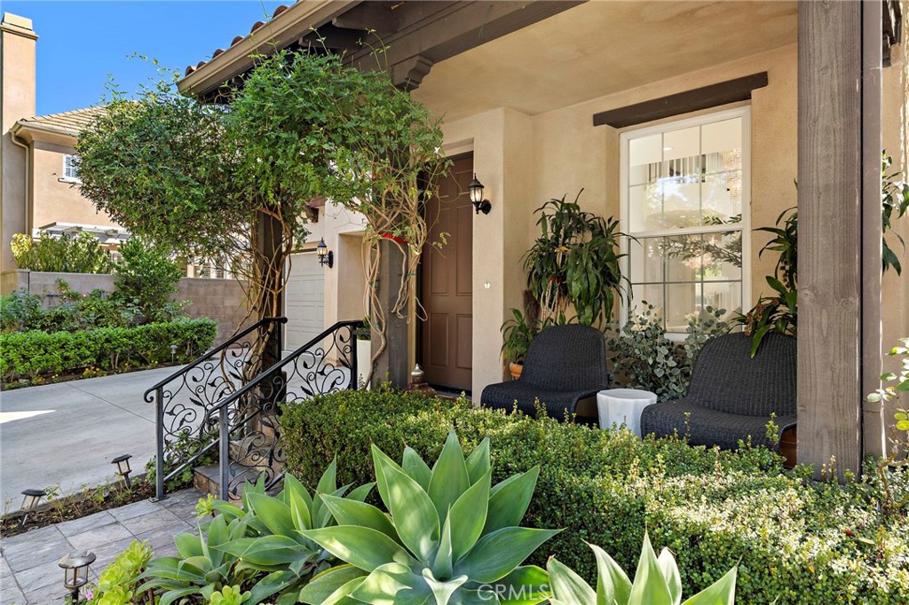 18 Bel Spring Irvine, CA 92602 - Photo 4 of 44 an entrance to house with yard and green space