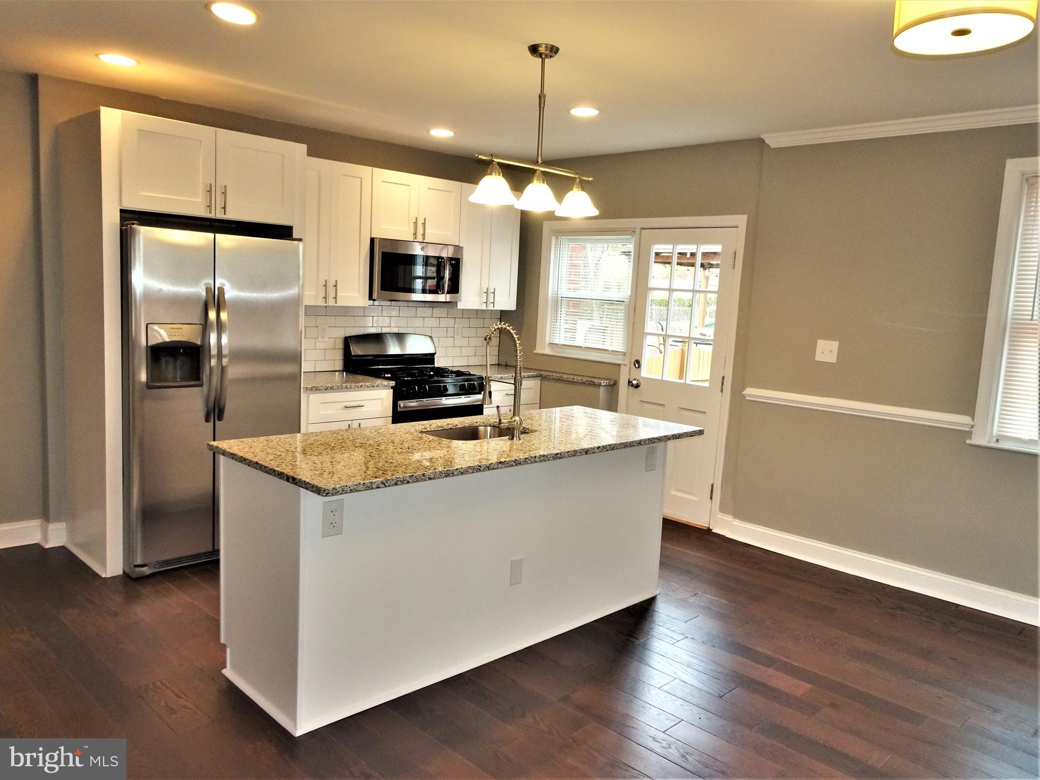 1216 Glenhaven Road Baltimore, MD 21239 - Photo 2 of 45 Fabulous open kit w/ wooden soft close cabinetry