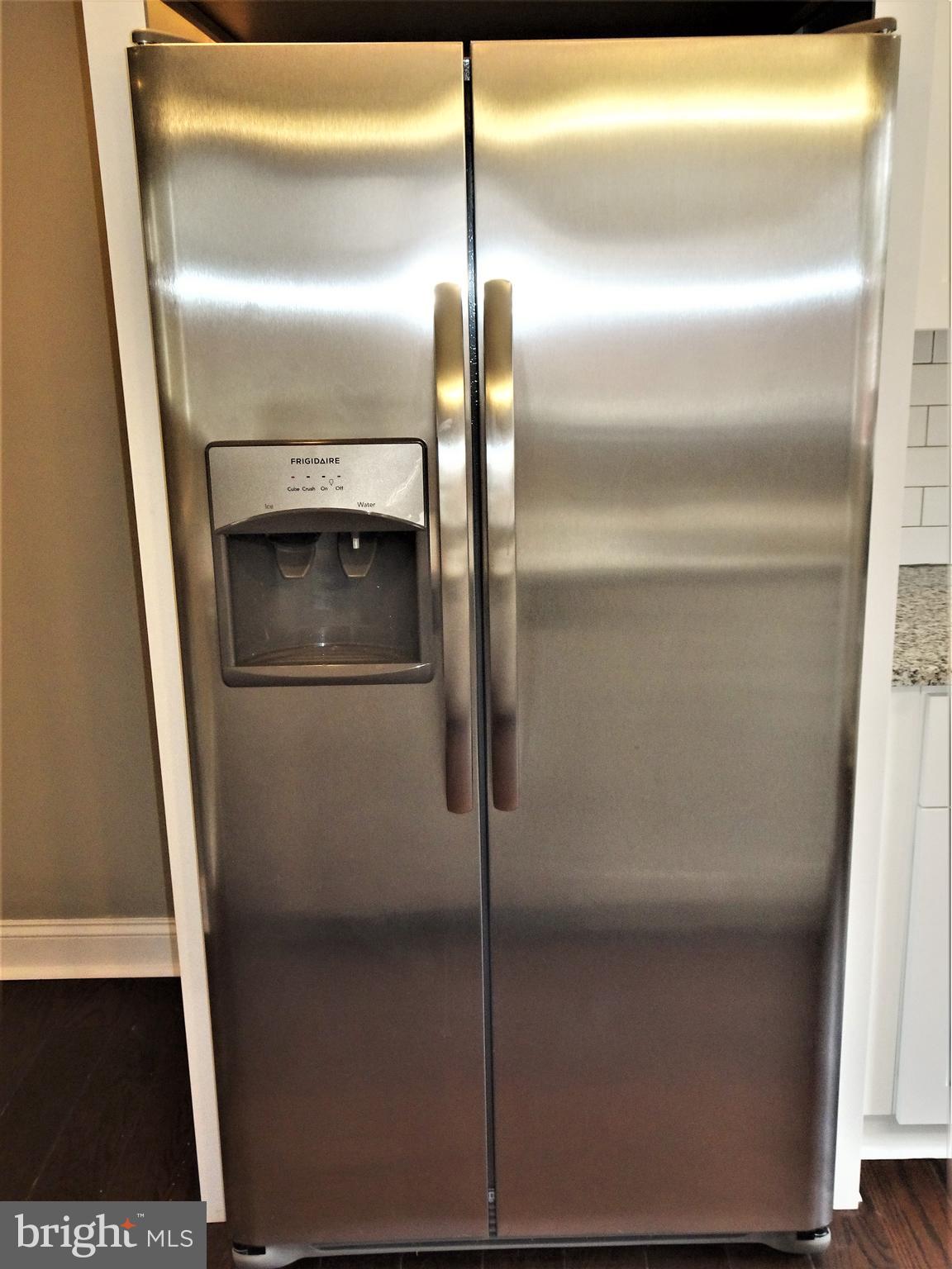1216 Glenhaven Road Baltimore, MD 21239 - Photo 11 of 45 SS side x side fridge with ice and water dispenser
