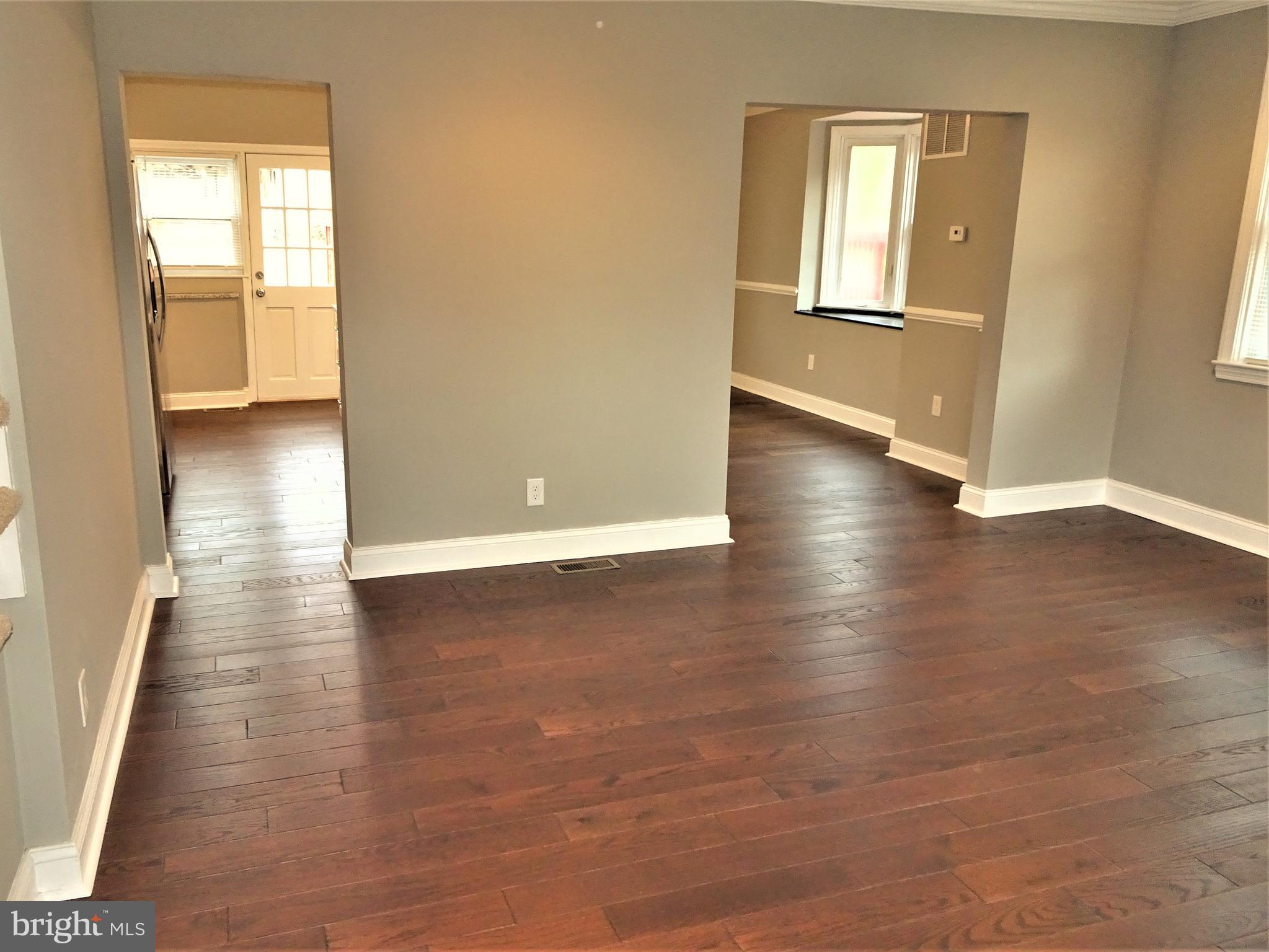 1216 Glenhaven Road Baltimore, MD 21239 - Photo 15 of 45 LR open to kitchen & DR