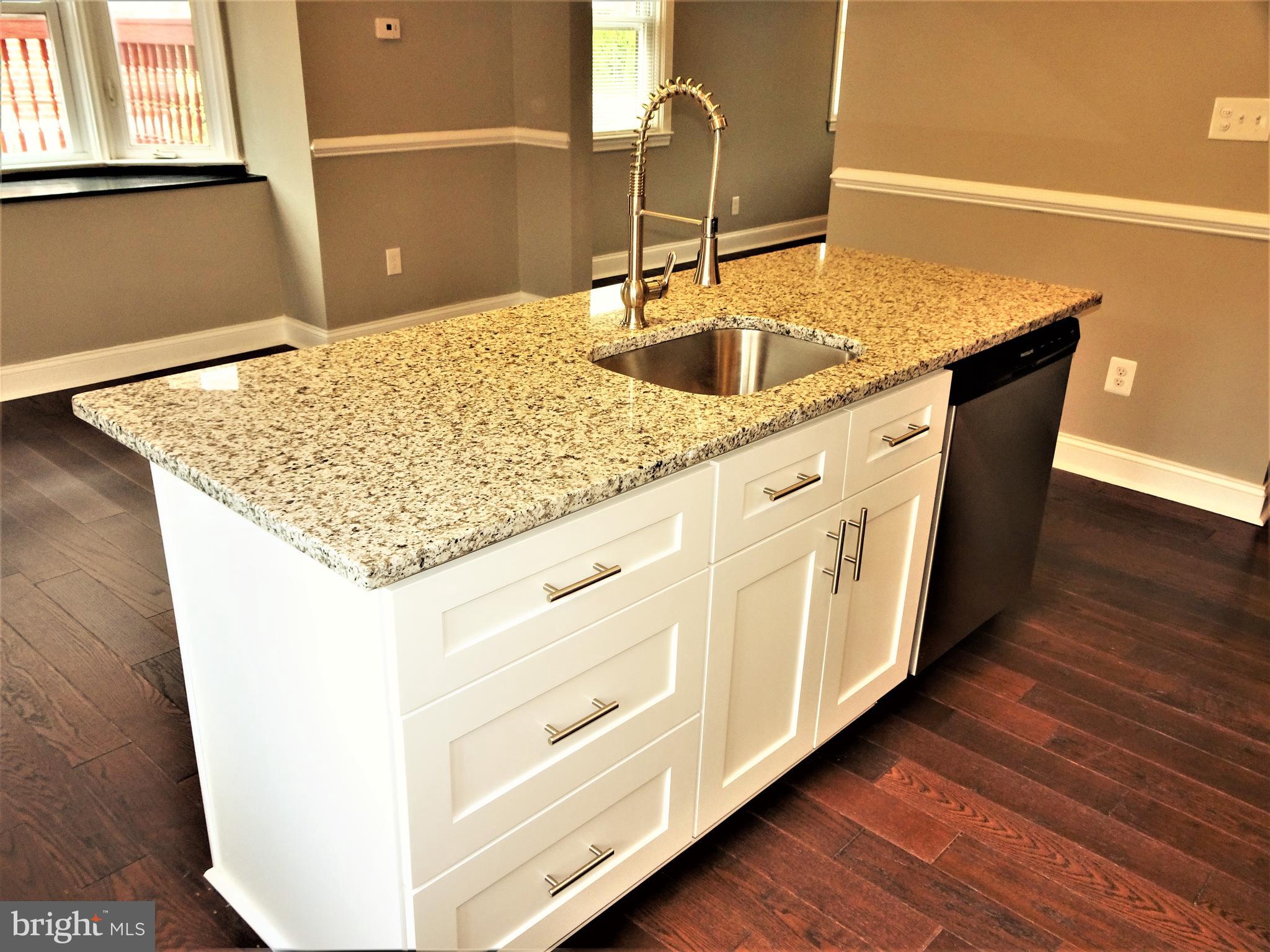 1216 Glenhaven Road Baltimore, MD 21239 - Photo 3 of 45 7' Island with counter seating & drawer cabinets