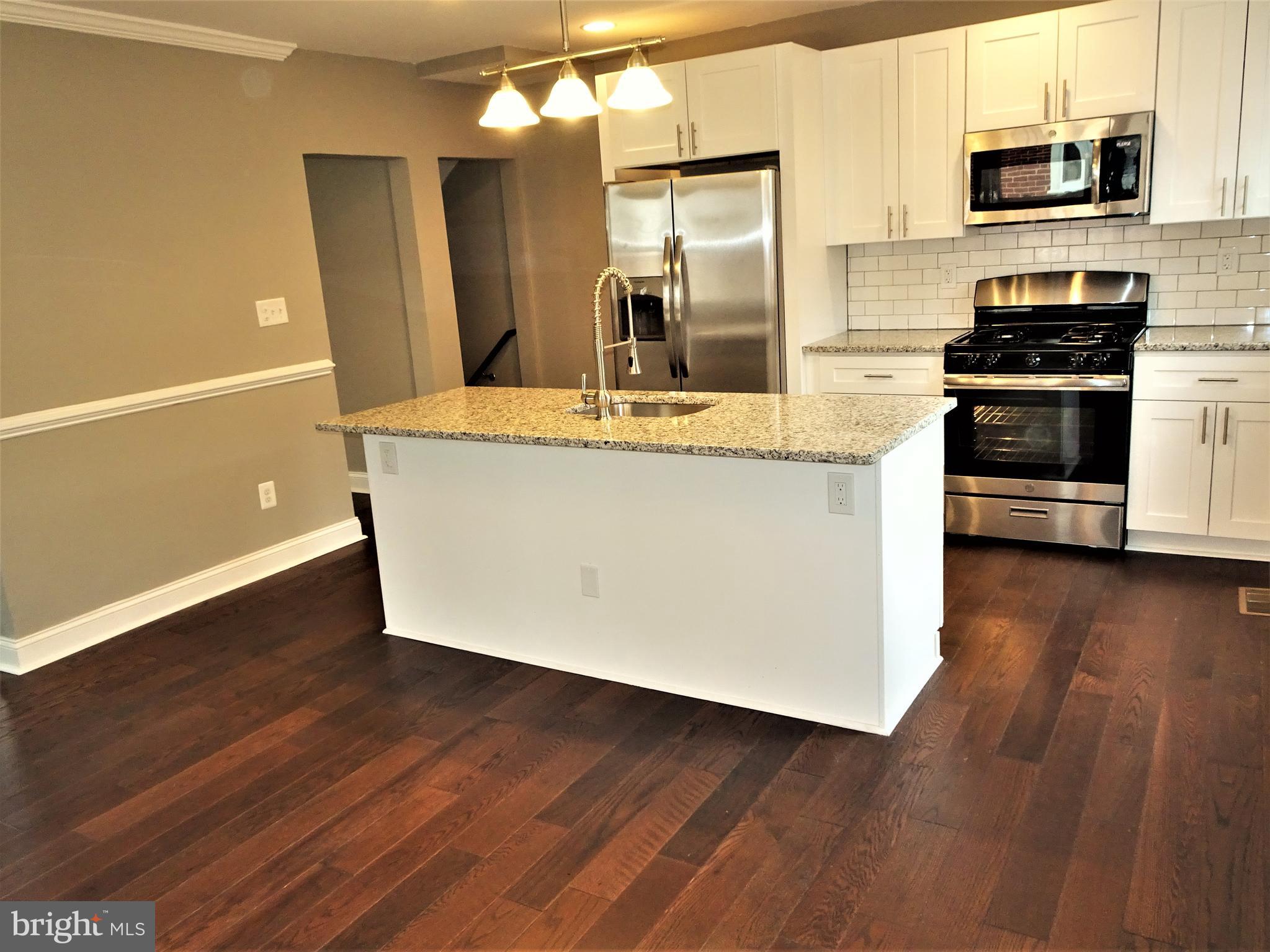 1216 Glenhaven Road Baltimore, MD 21239 - Photo 4 of 45 Wood floors throughout first floor