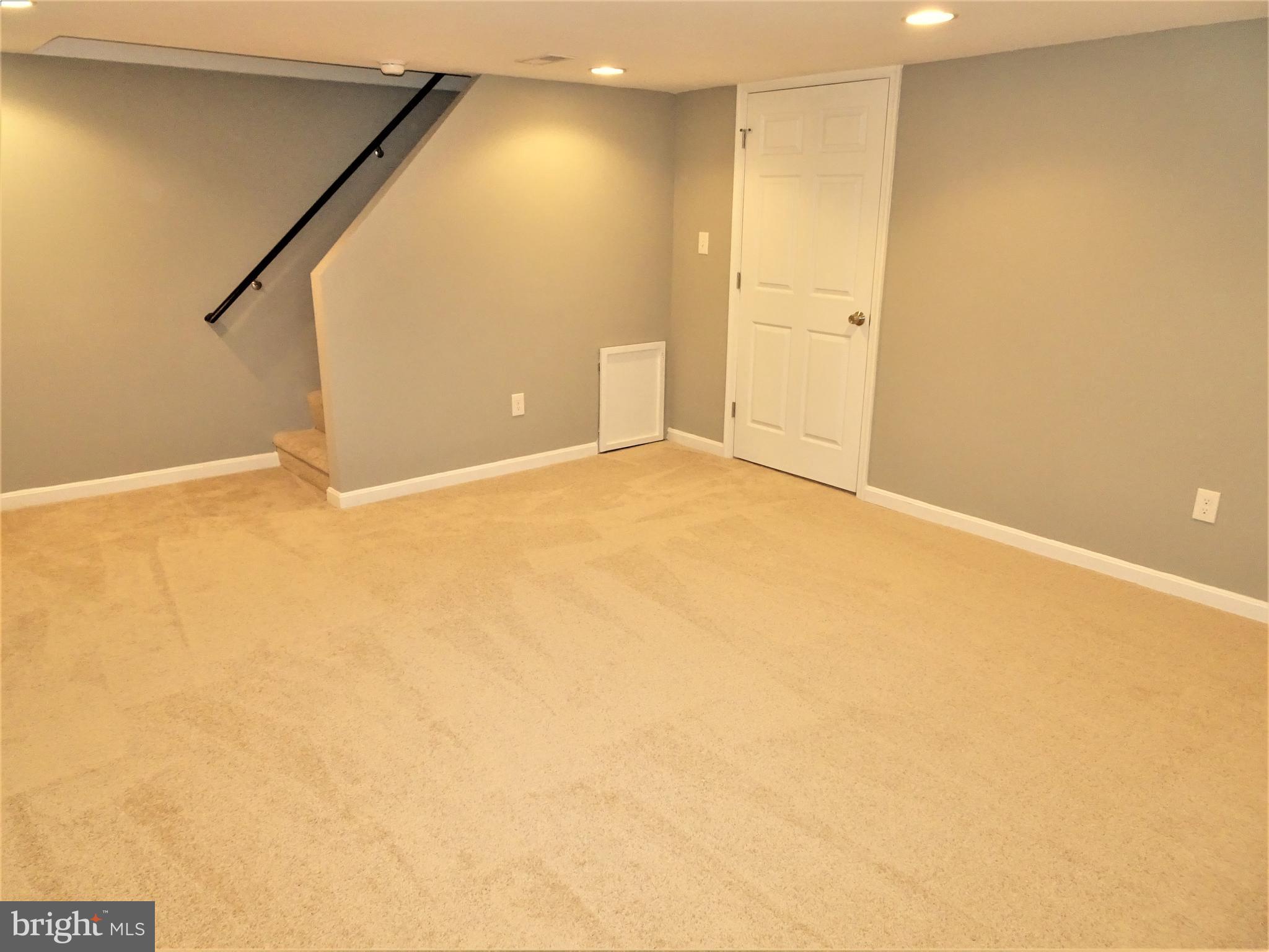 1216 Glenhaven Road Baltimore, MD 21239 - Photo 33 of 45 Family room - carpet throughout LL