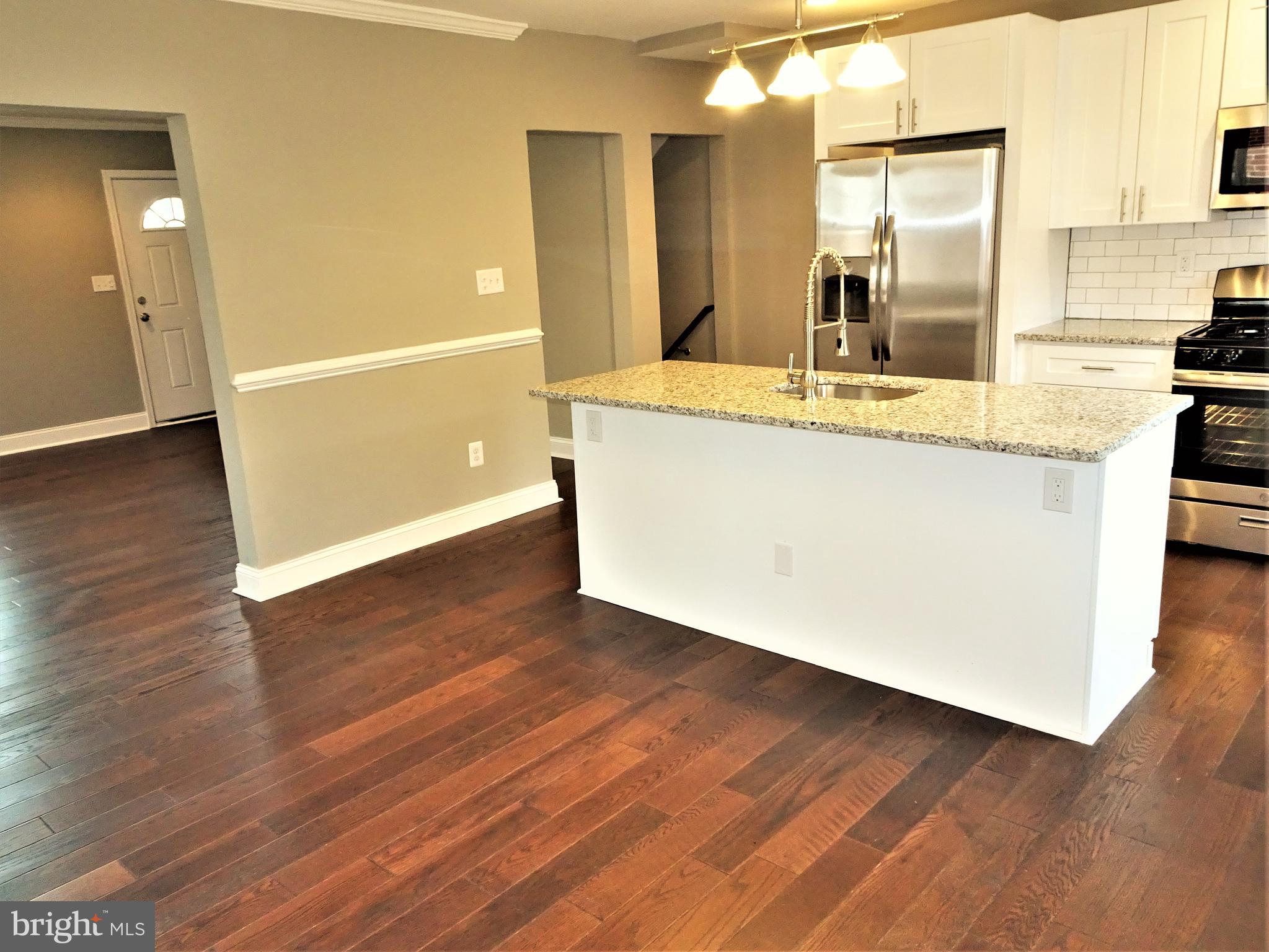 1216 Glenhaven Road Baltimore, MD 21239 - Photo 10 of 45 Kitchen opens to dinning room - great entertaining