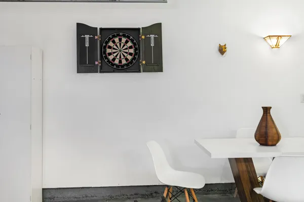 a bedroom with a bed and a night stand