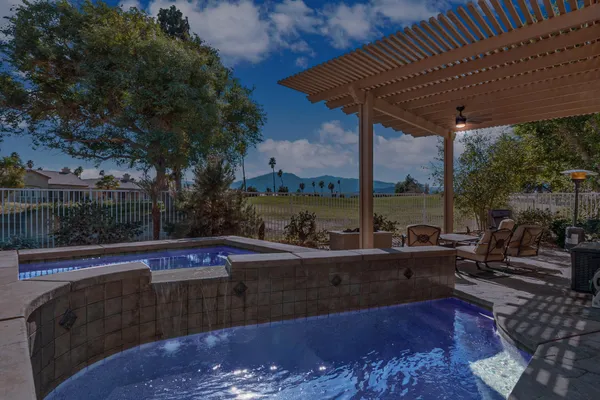 a living room with couch and a table