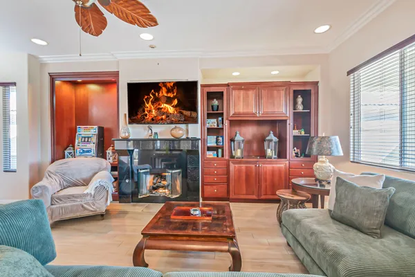 a bathroom with a glass shower door and a glass door