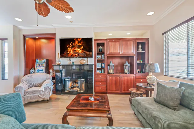 a bathroom with a glass shower door and a glass door
