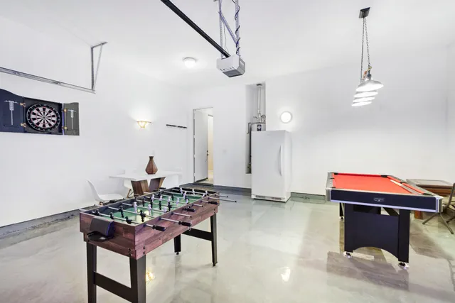 a room with furniture and a chandelier