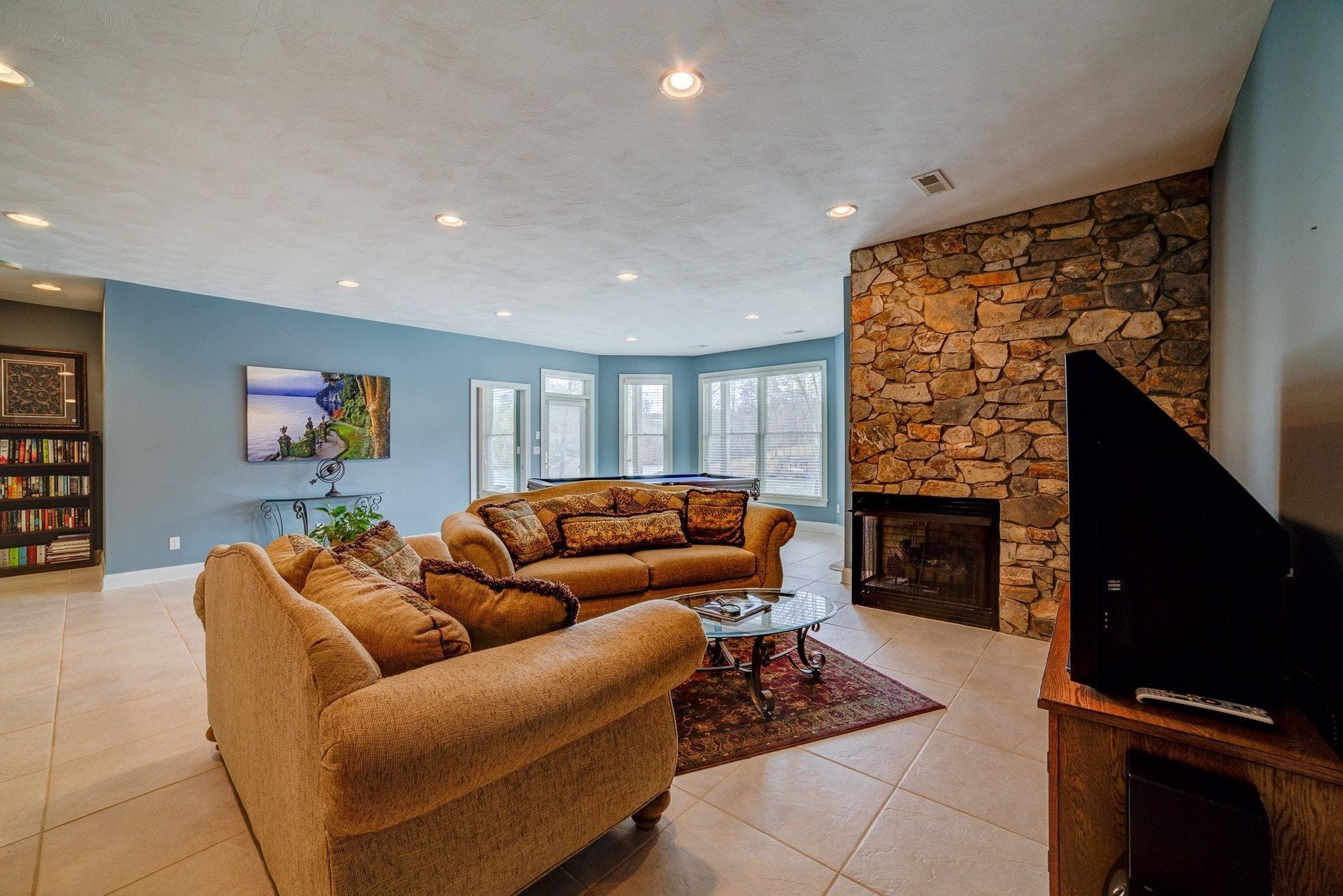 270 Cedar Bay Road Union Hall, VA 24176 - Photo 38 of 77 Lower level living-propane fireplace