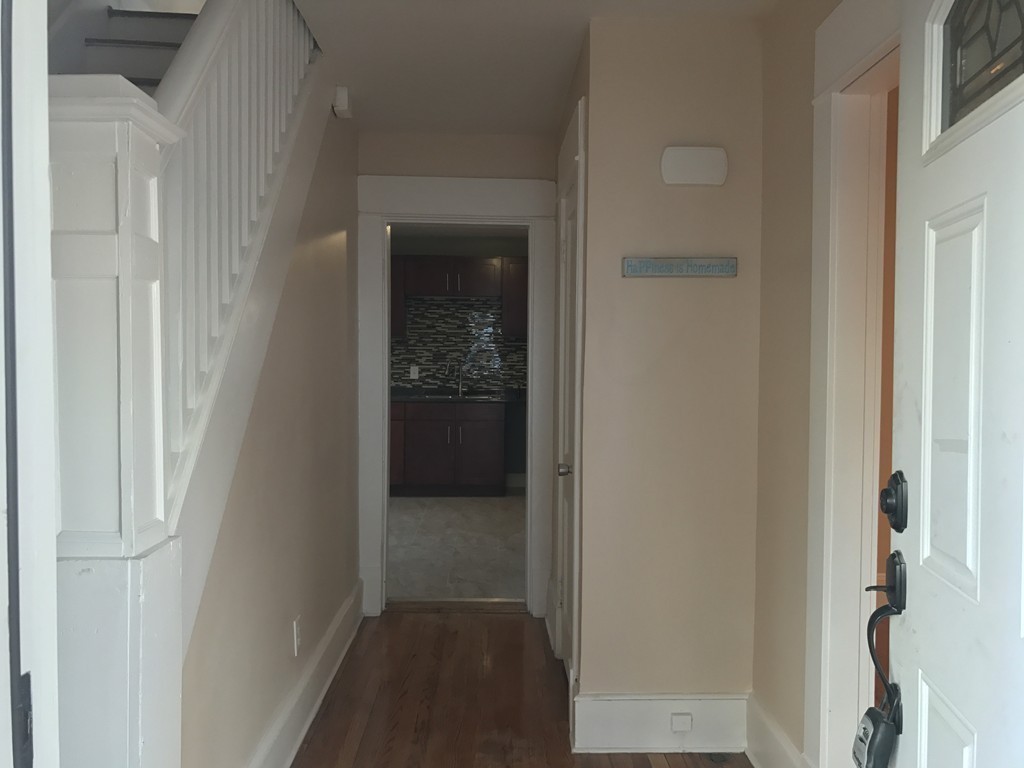 97 Penacook Street Springfield, MA 01104 - Photo 10 of 11 a view of a hallway with a white walls