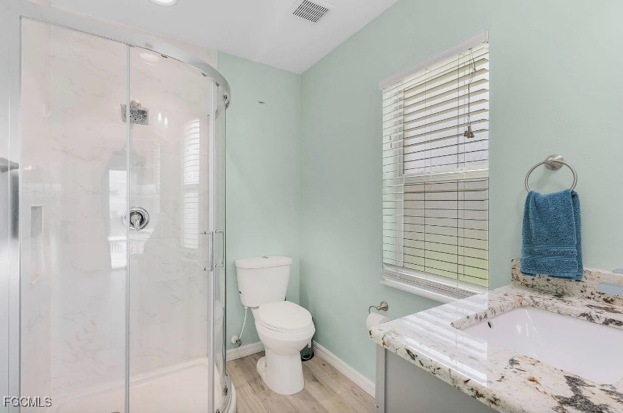 4885 East Riverside Drive Fort Myers, FL 33905 - Photo 25 of 45 a bathroom with a sink and toilet