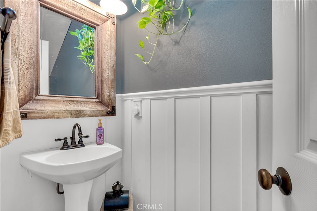 5 Surrey Farm Way Ladera Ranch, CA 92694 - Photo 34 of 46 Downstairs Bathroom Vertical Panel Moulding