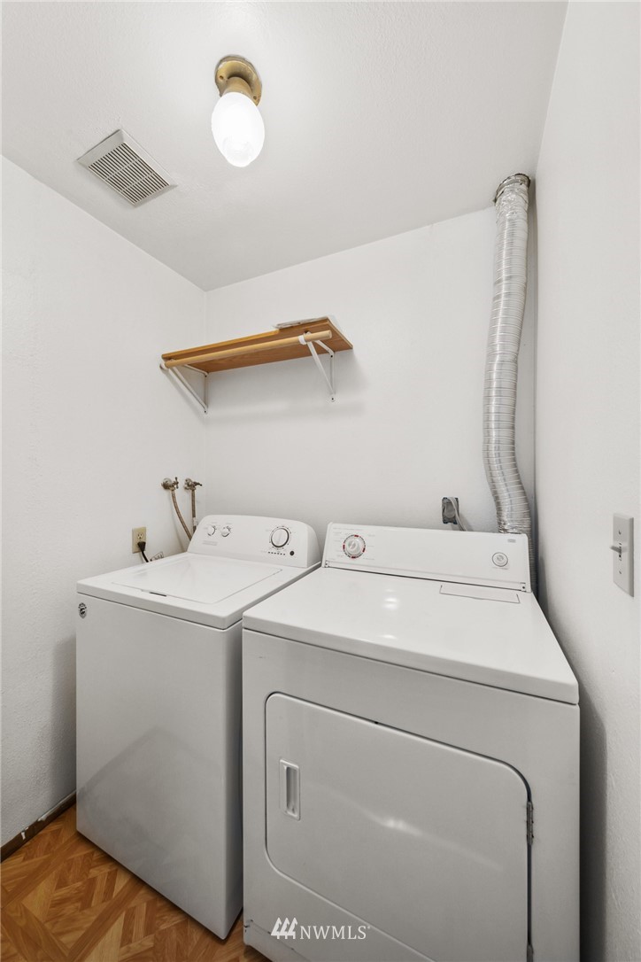 17536 149th Avenue Southeast, Unit O12 Renton, WA 98058 - Photo 11 of 12 a utility room with dryer and washer