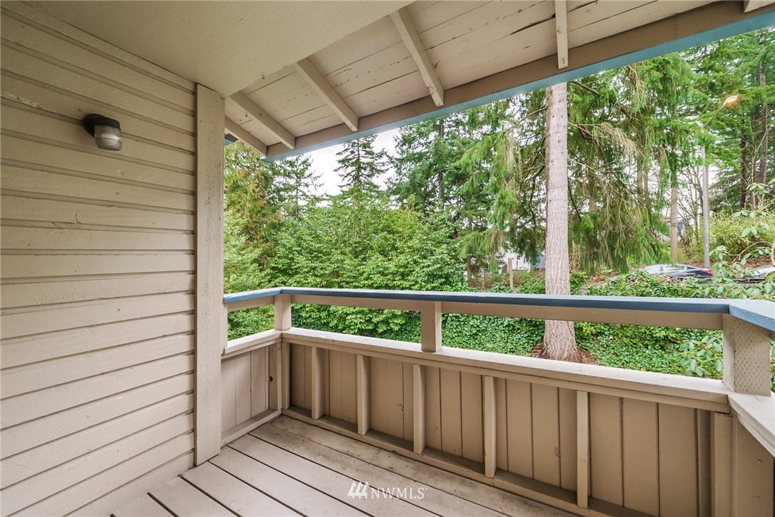 17536 149th Avenue Southeast, Unit O12 Renton, WA 98058 - Photo 12 of 12 a view of a balcony with furniture